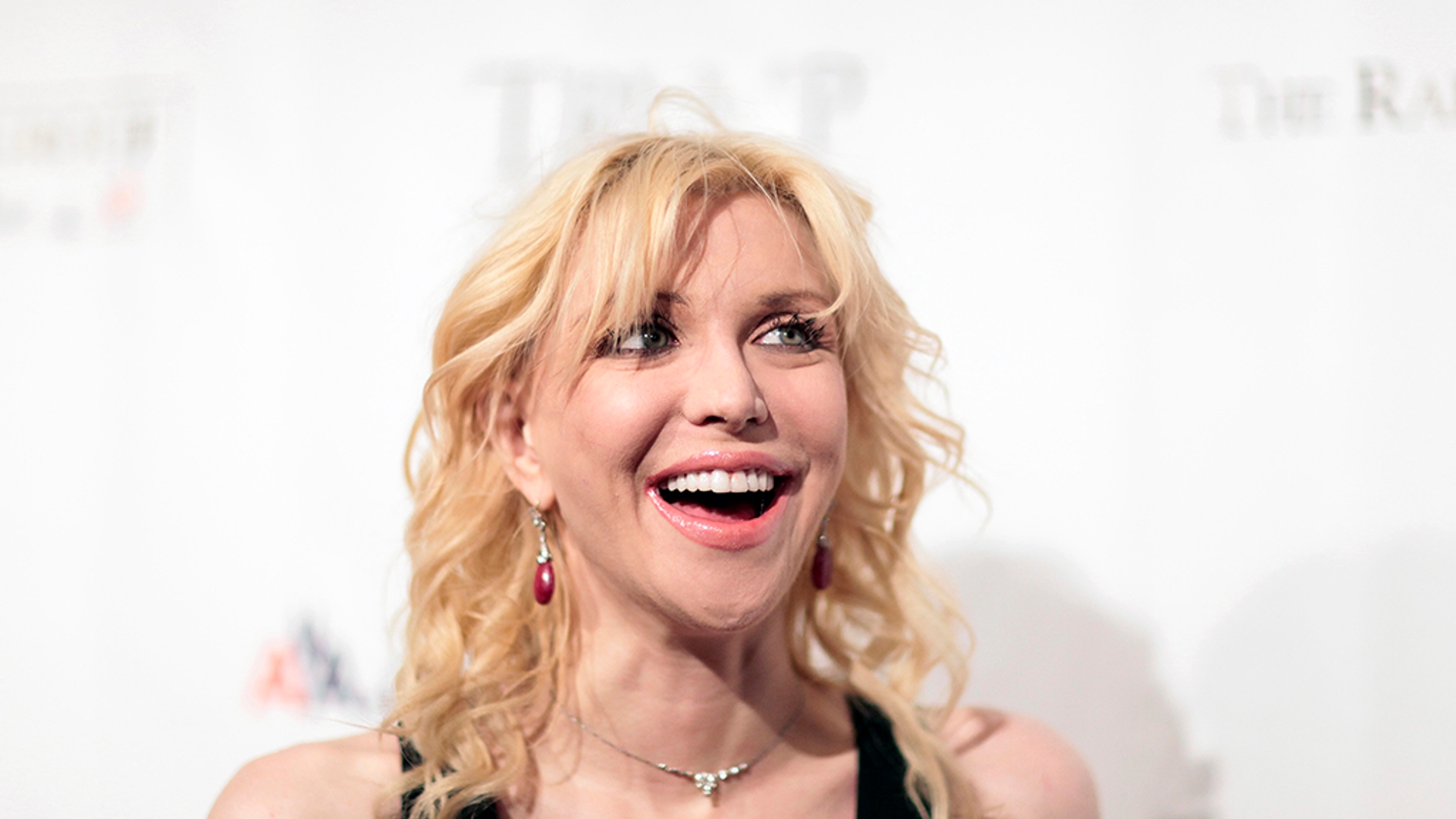 Actress Courtney Love arrives at "An Enduring Vision," a benefit dinner for the Elton John Aids Foundation in New York